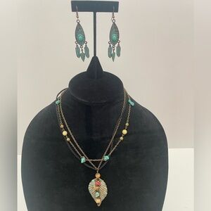 Multiple strand beaded leaf necklace and leaf drop earrings.